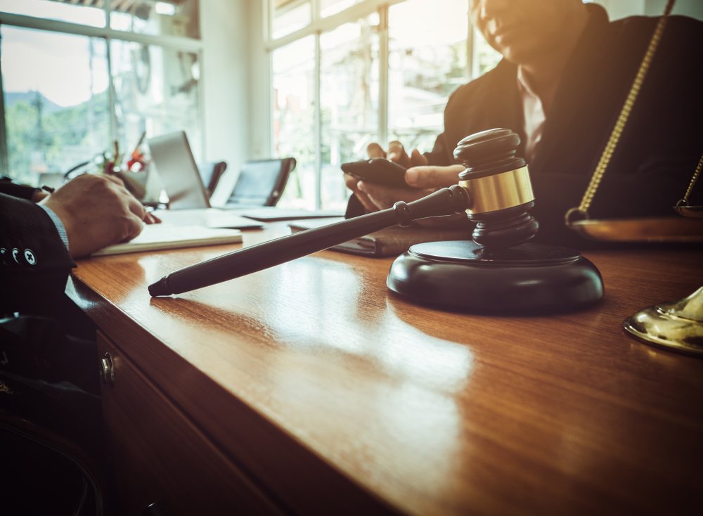 Photo of a Lawyer with a Client